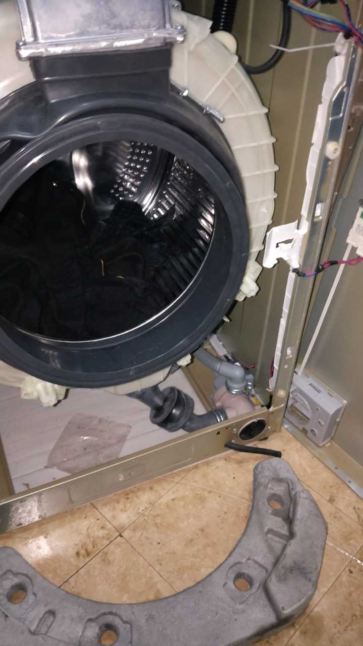 洗衣机修理漏水图片