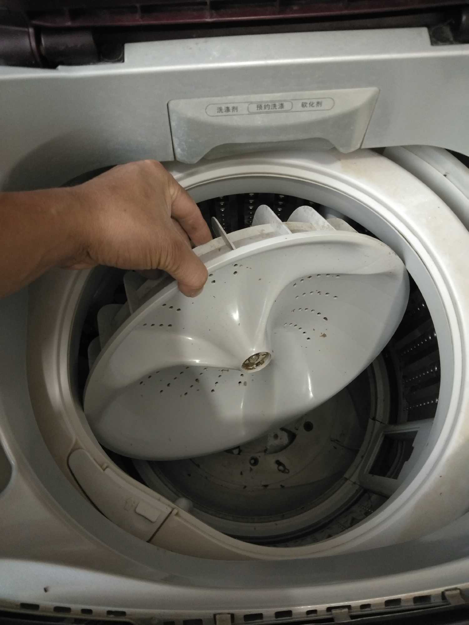 海尔双动力洗衣机内桶怎么去掉